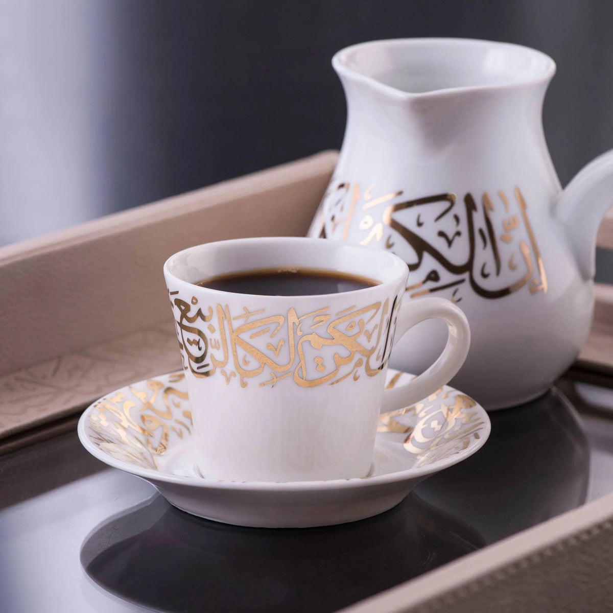 Dimlaj Kareem coffee cups and saucers in gold-gilded porcelain, set of six, styled in a room setting