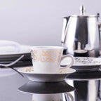 Dimlaj Kareem coffee cups and saucers in gold-gilded porcelain, set of six, detail view