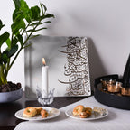 Dimlaj Kareem large square plate in 22K gold-gilded porcelain, styled in a room setting