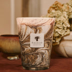 Baobab Collection Leaves Naïs 5-wick scented candle in mouth-blown glass, 3kg, styled in a room setting (3)