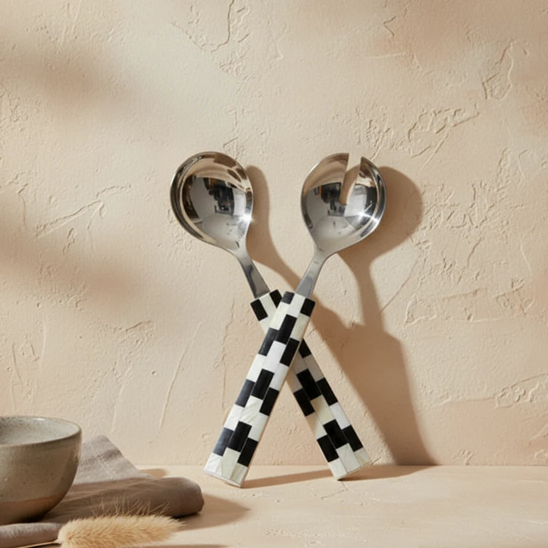Be Home Finlay inlay salad serving set in stainless steel, styled in a room setting 3