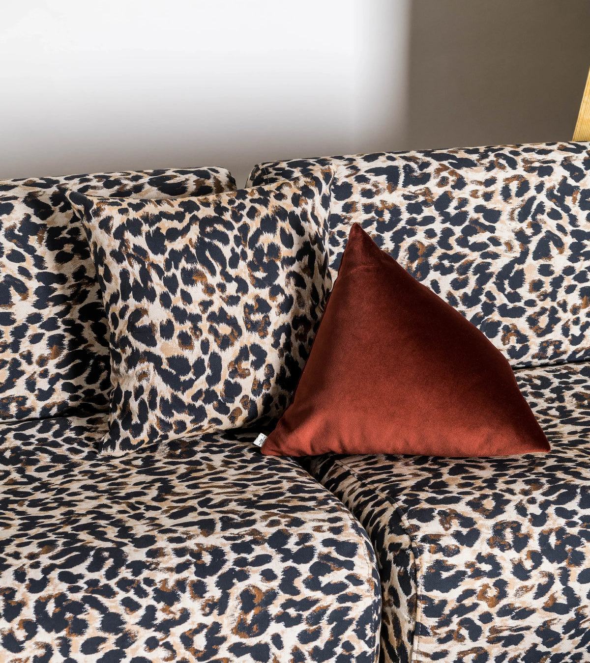 The Socialite Family Carino leopard jacquard rectangular cushion, 50x30cm, styled in a room setting 2
