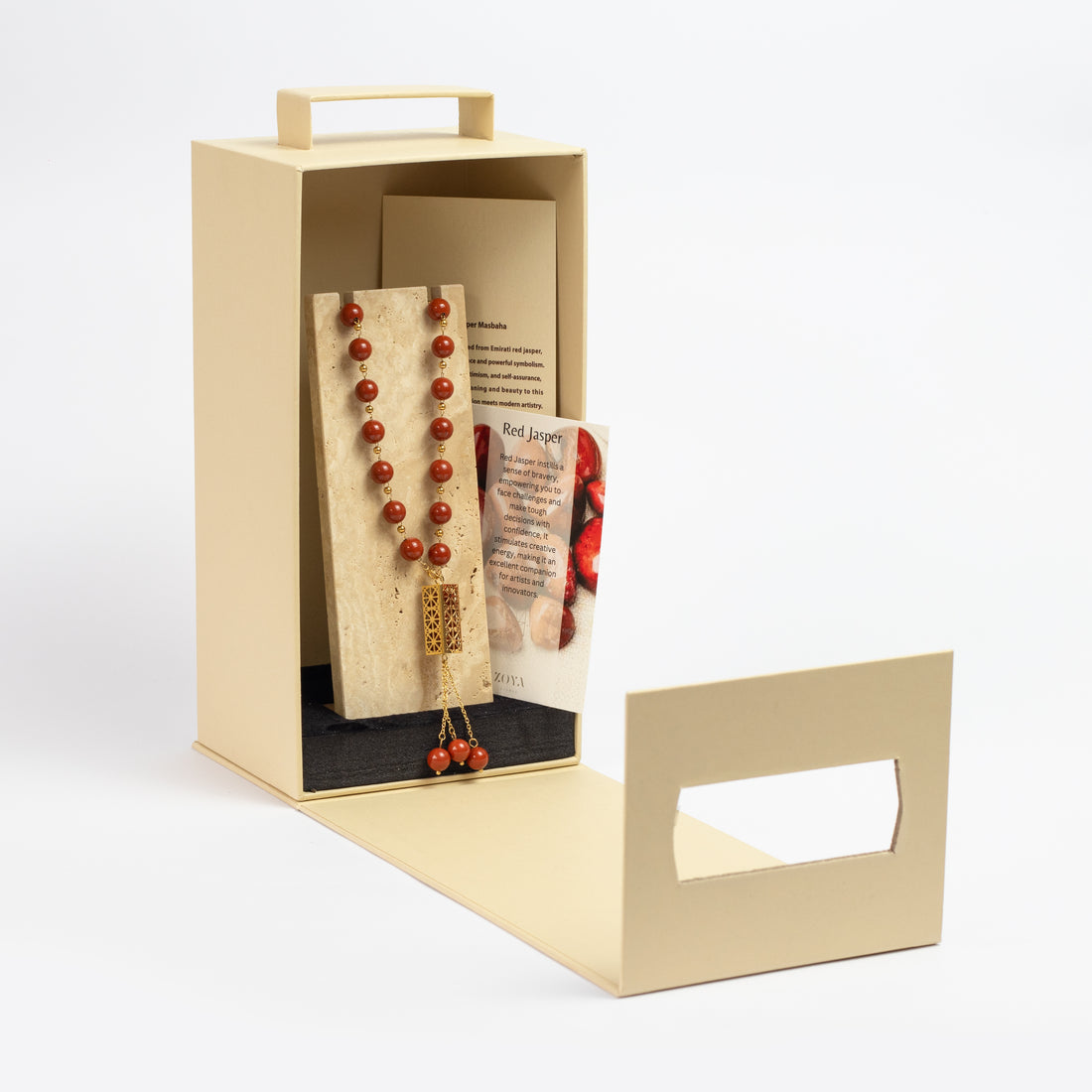 Zoya Stones Red Jasper masbaha with travertine stand angle view